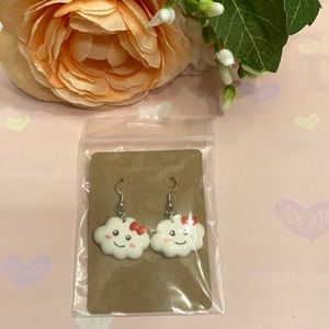 Happy smiley face cloud earrings.